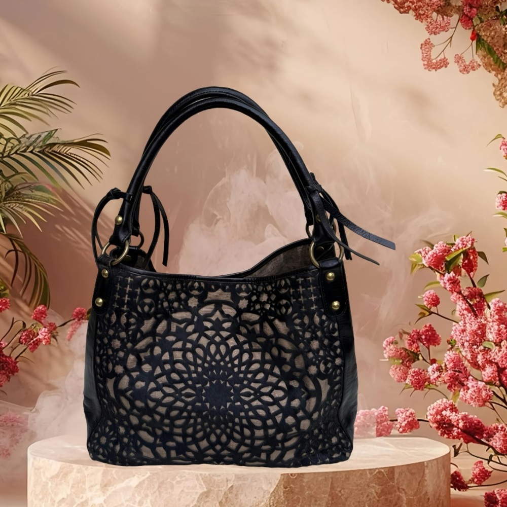 Isabella Fiore leather and starburst laser cut design